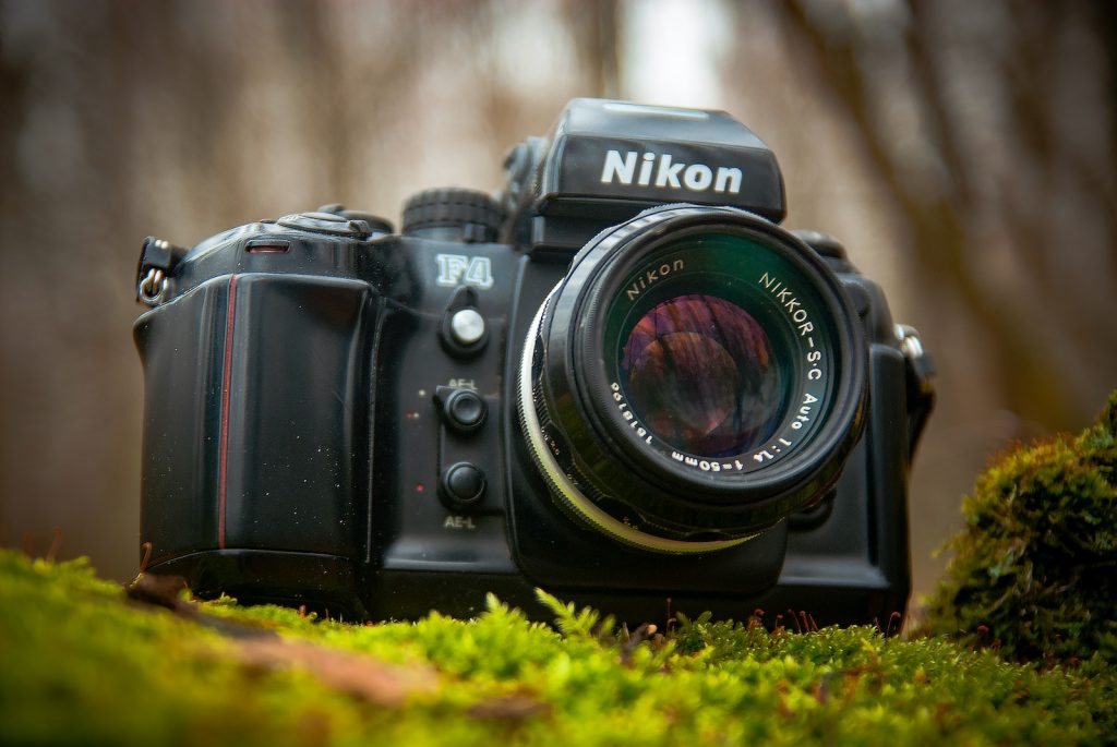 close-up photography of black Nikon DSLR camera